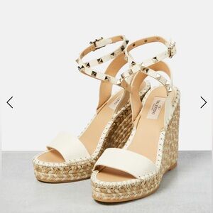 VALENTINO GARAVANI
Rockstud leather wedge sandals